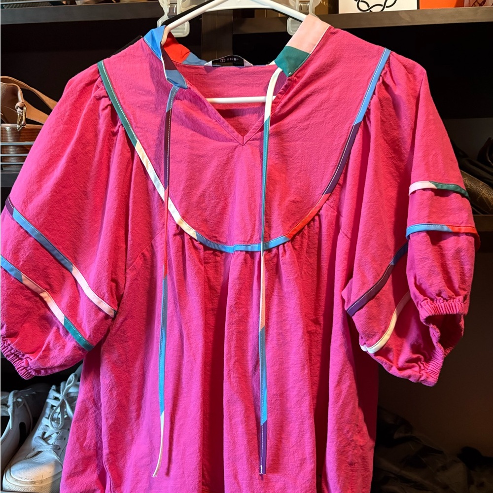 Vibrant Pink Blouse with Colorful Accents